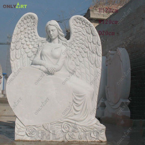 Angel sculpture sitting on the heart