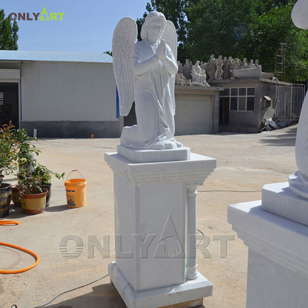 outdoor praying angel statue