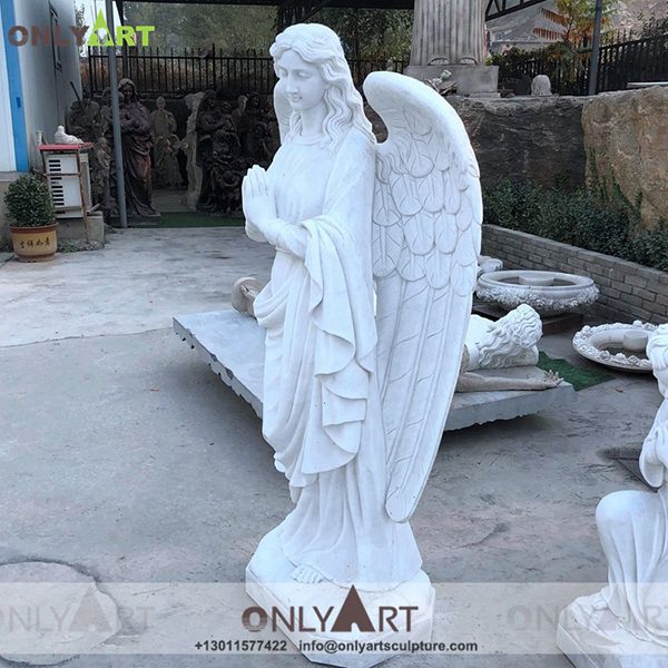 outdoor praying angel statue